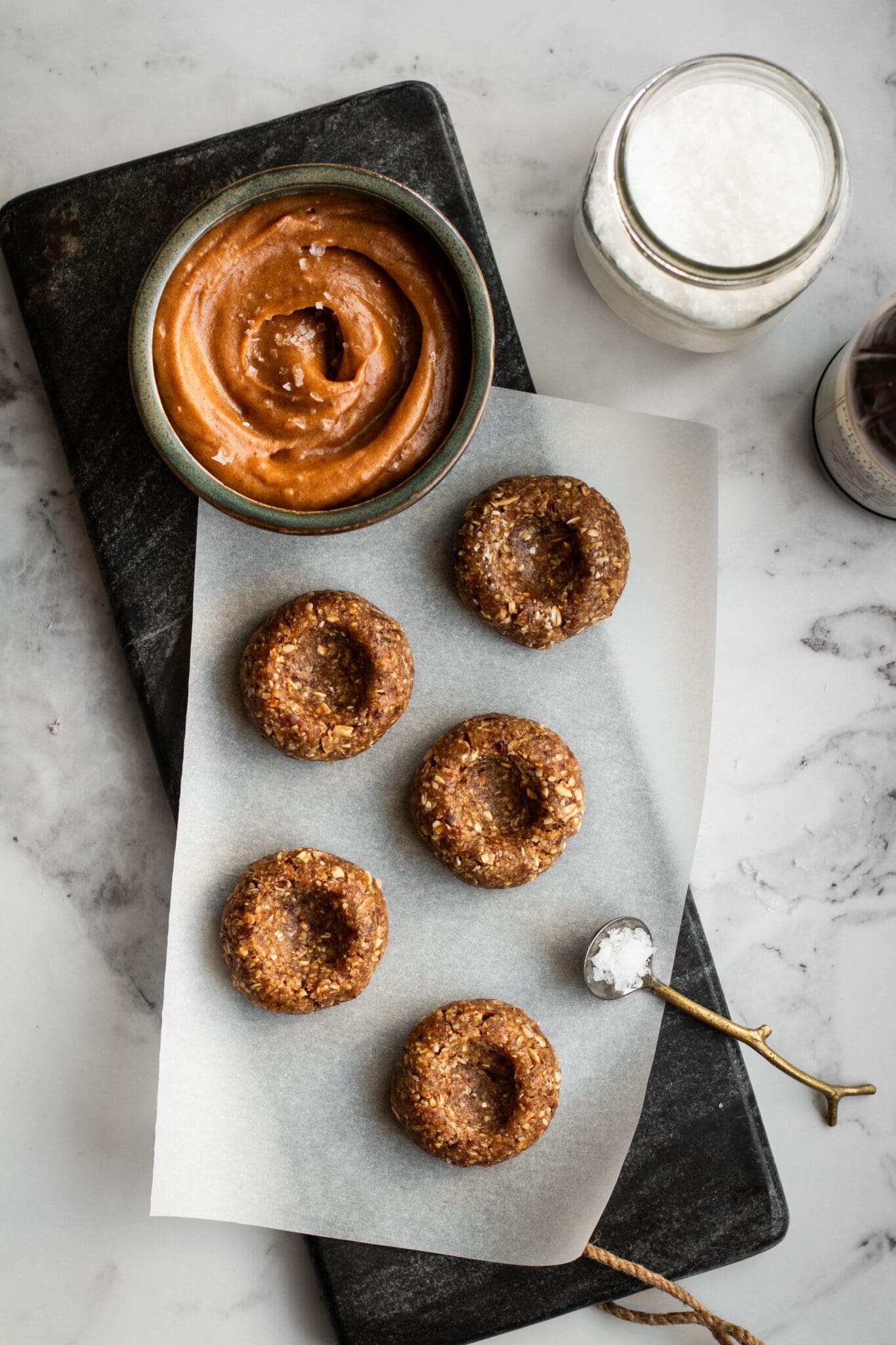 Salted caramel thumbprint cookies seen from the top.