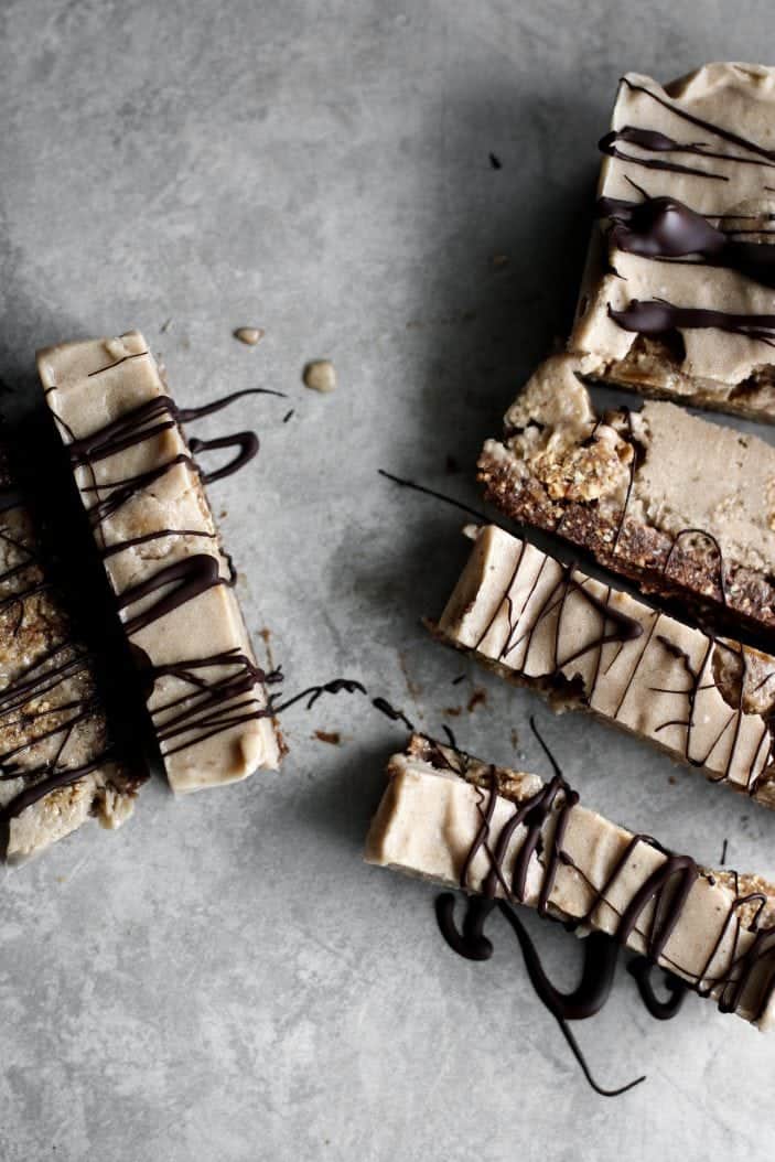 Brownie Cookie Dough "Ice Cream" Bars seen from overhead with chocolate drizzle