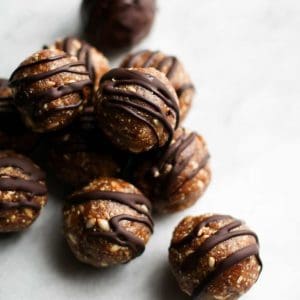 Healthy Peanut Butter Crunch Balls in a stack