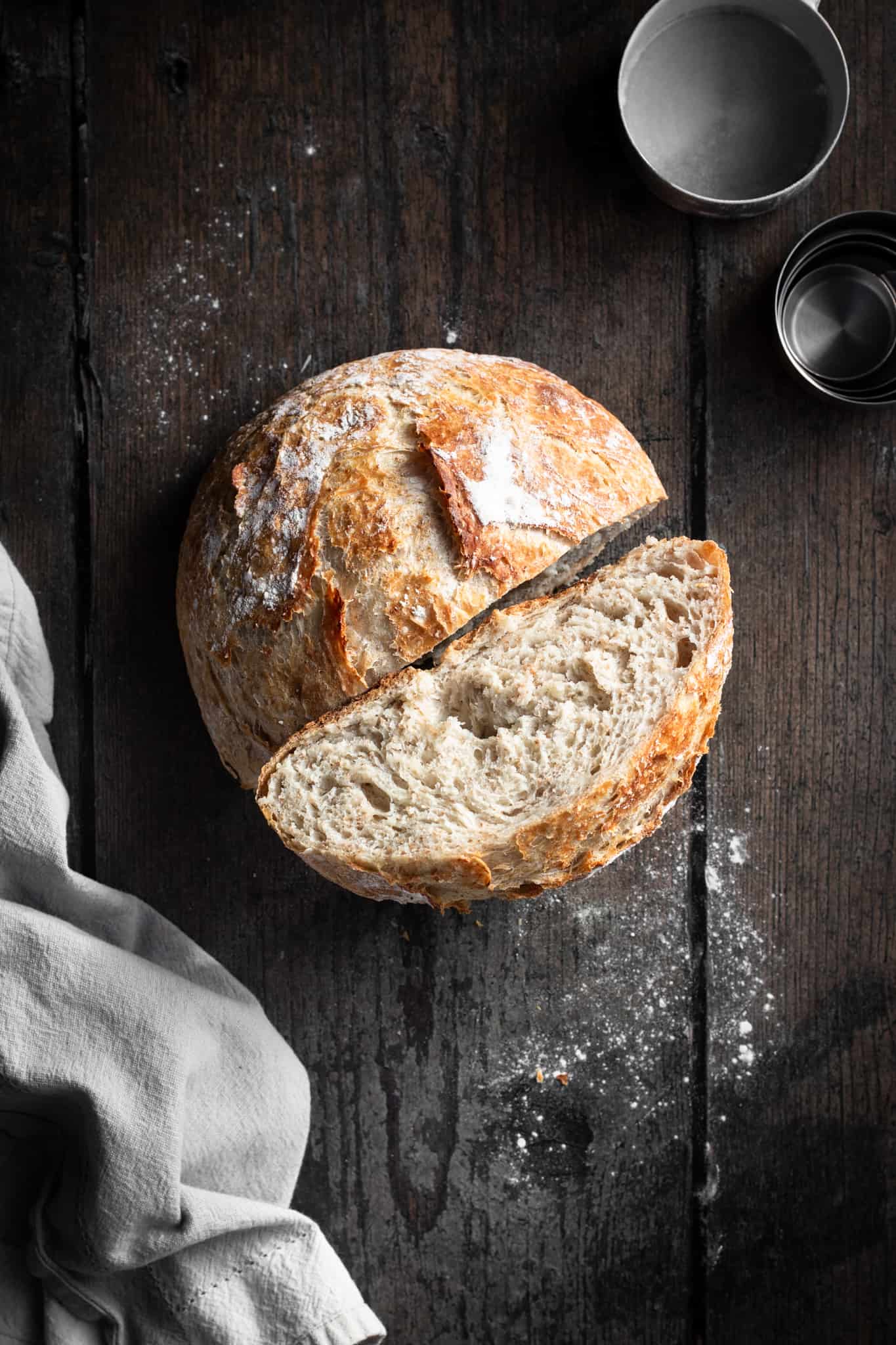 no-knead whole wheat bread cut in half