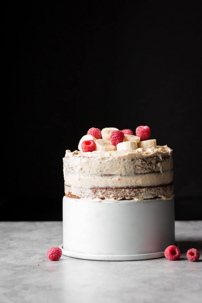 Spiced Banana Cake with Cream Cheese Frosting and raspberries