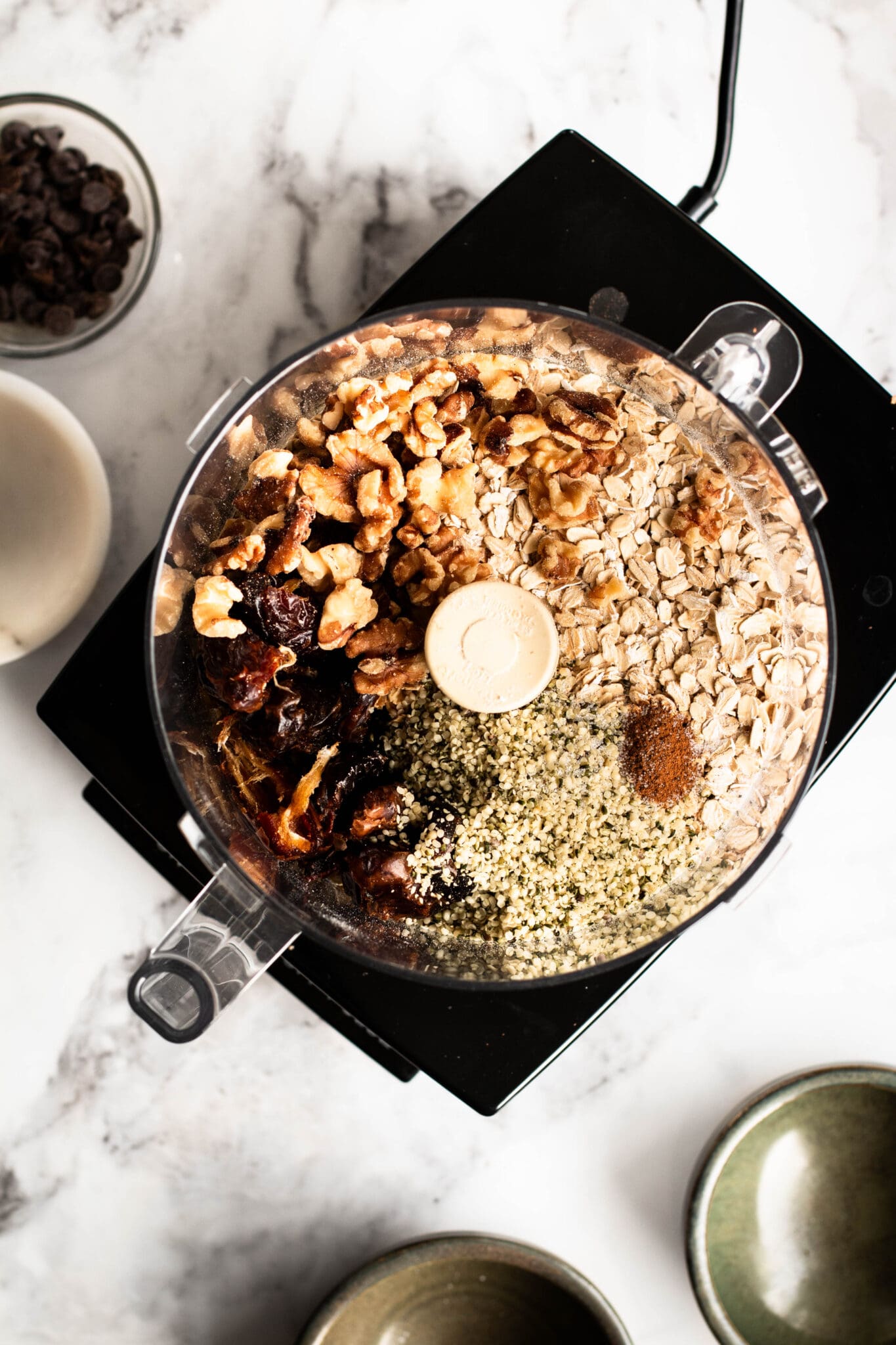 No-bake granola bar ingredients in a food processor seen from the top