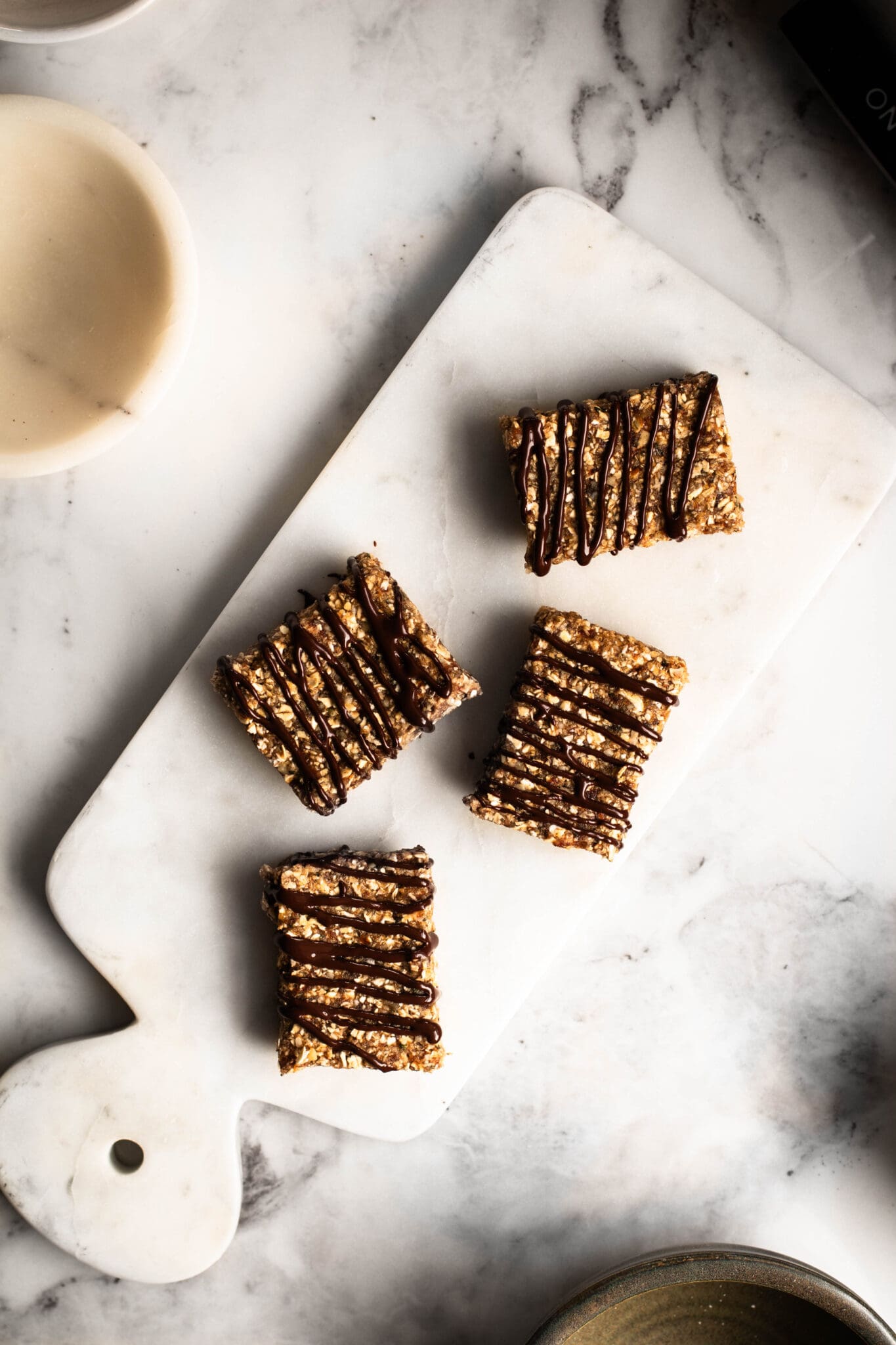 No-bake walnut granola bars on a serving board, seen from the top