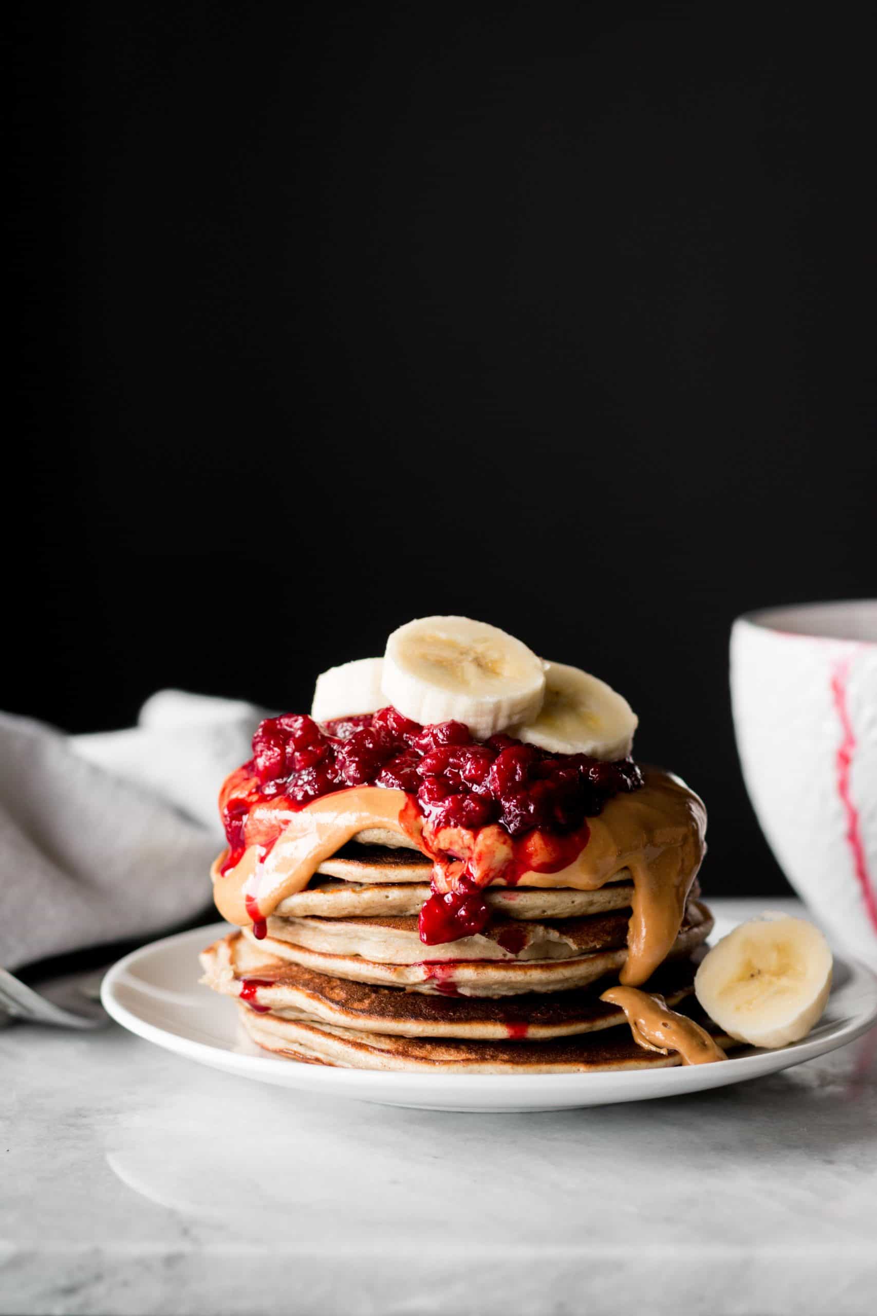 stacked pancakes with berries