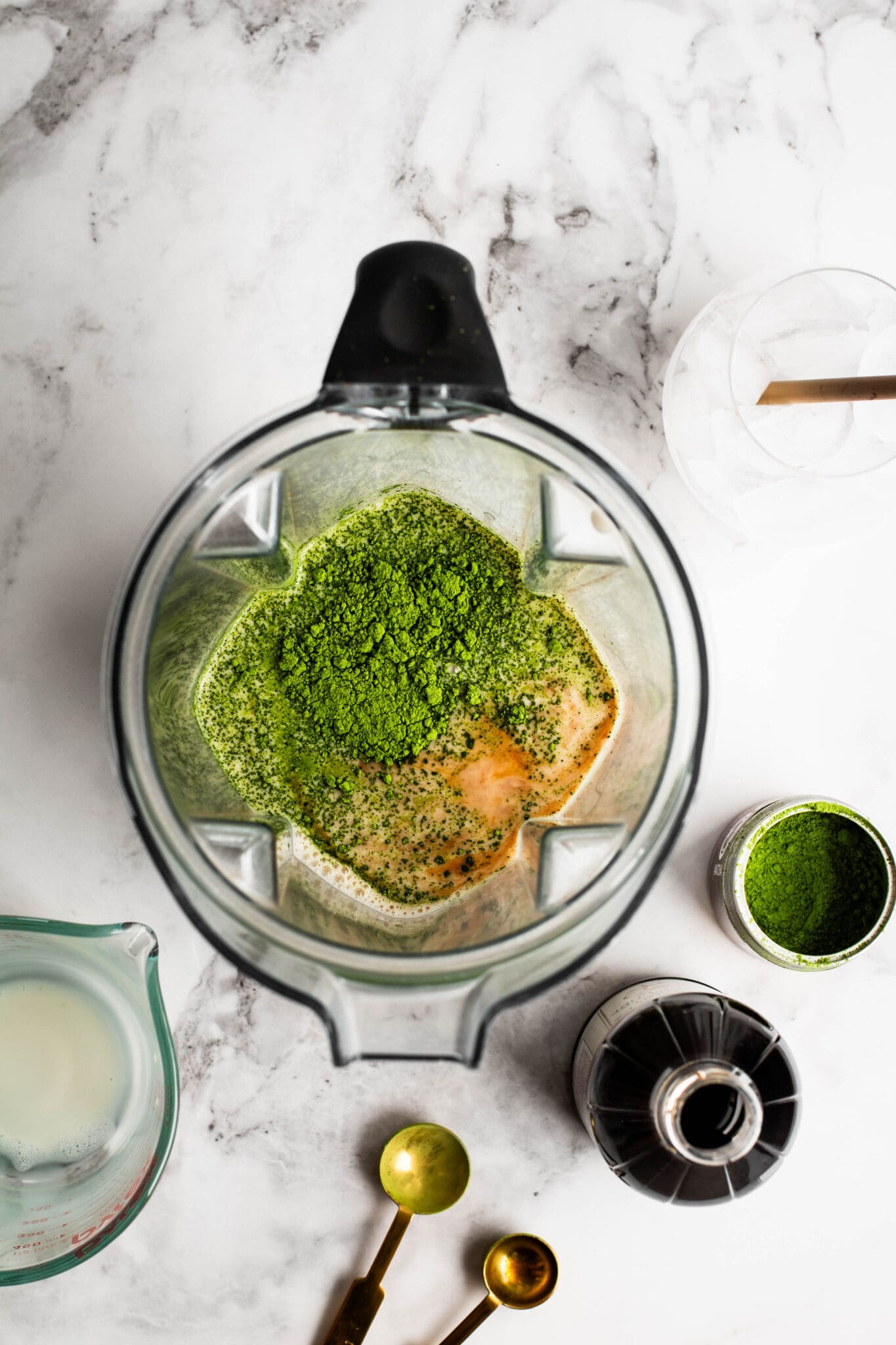 matcha, milk and vanilla in a blender
