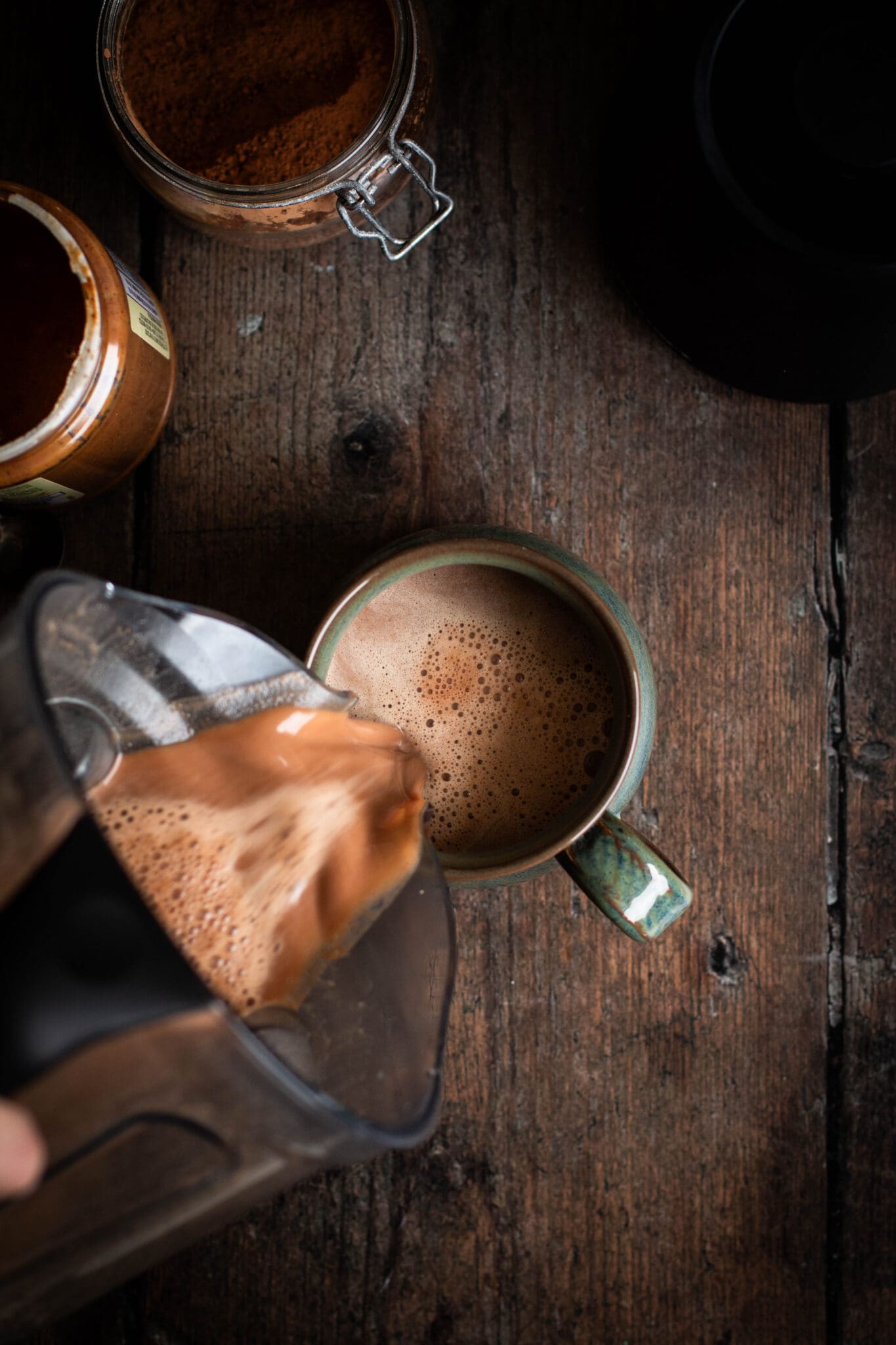 blender almond hot cocoa poured in a cup