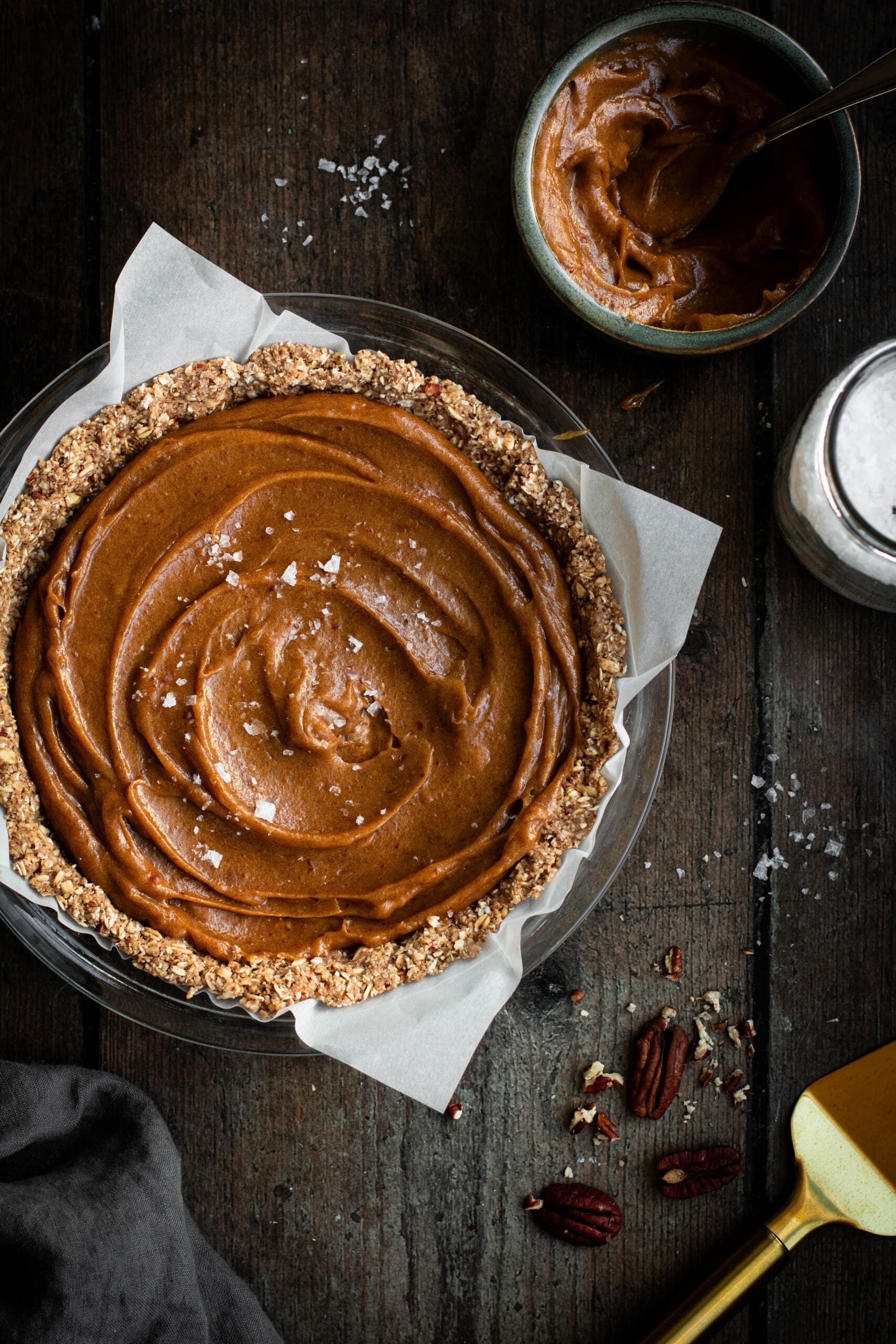 date caramel pecan pie seen from the top
