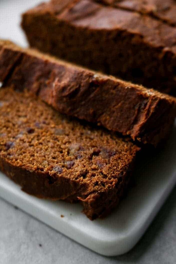 Sliced Pumpkin Bread (Gluten-free, No Added Sugar) seend from the side as great holiday desserts