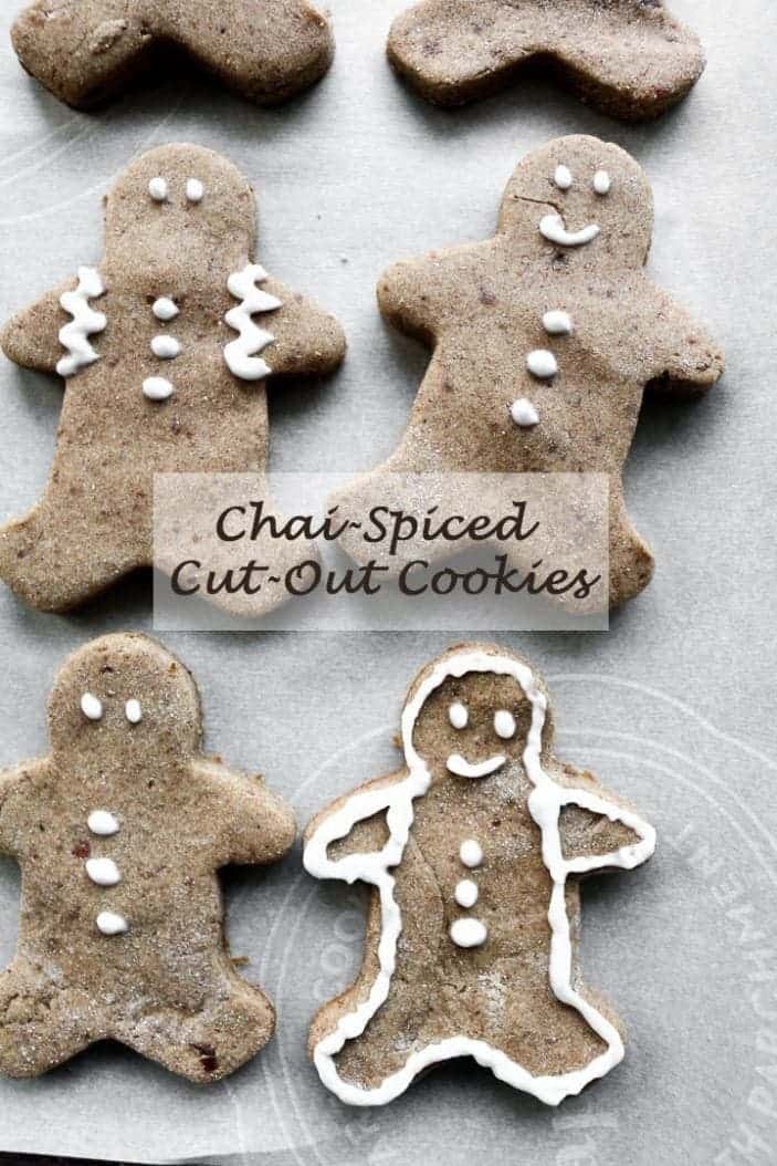 Chai-Spiced Cut-Out Cookies shaped as gingerbread men with icing