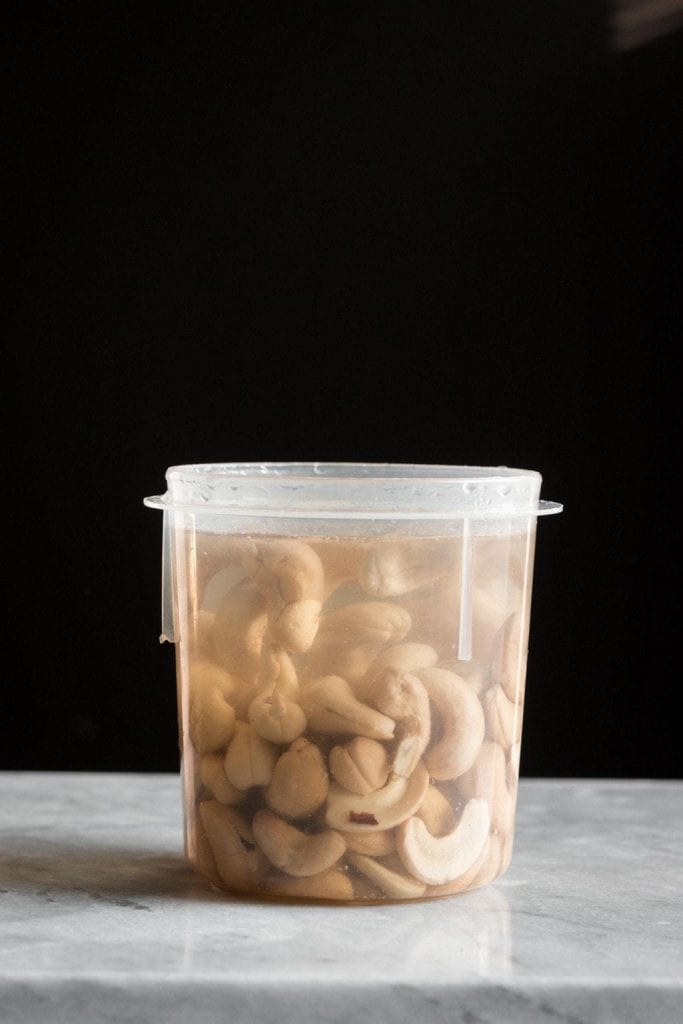 cashews soaking in a jar