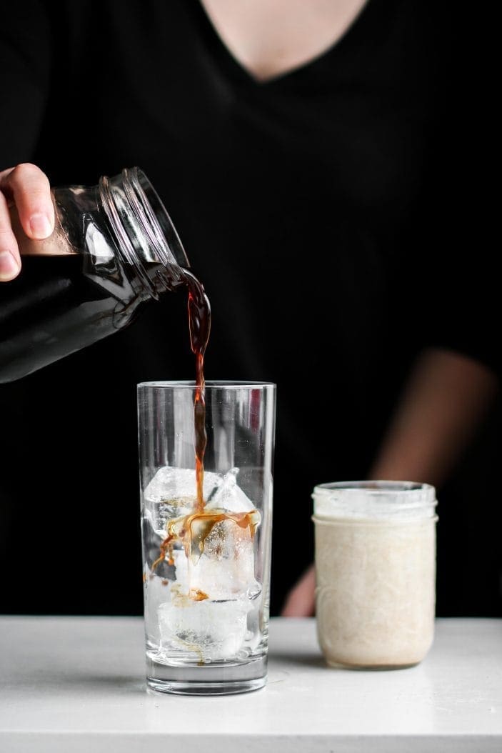 cold brew poured in a glass with ice