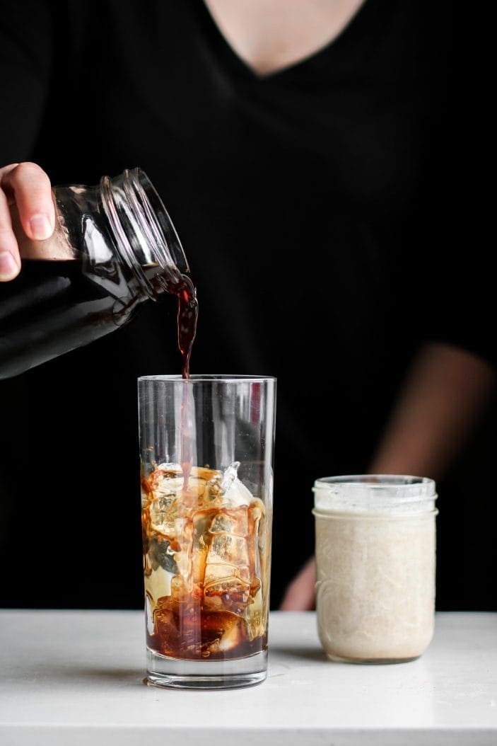 cold brew poured in a glass with ice