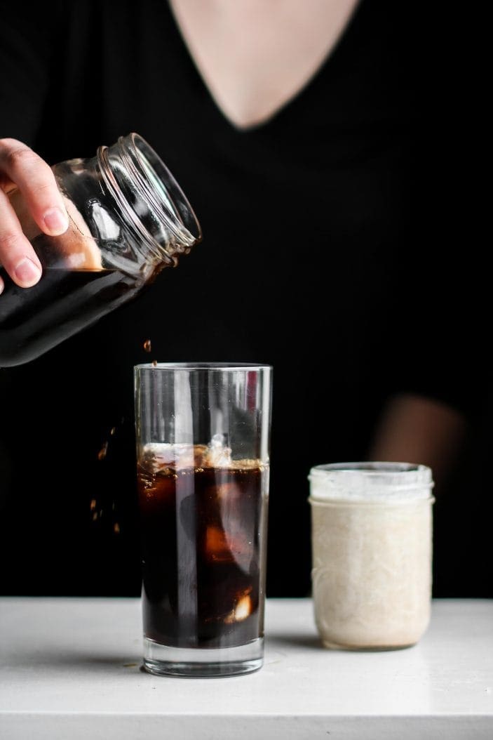 cold brew poured in a glass with ice