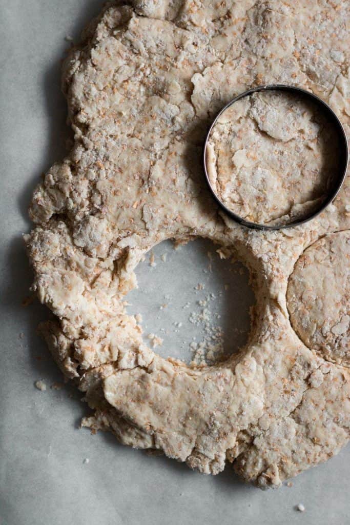 biscuit dough with cookie cutter