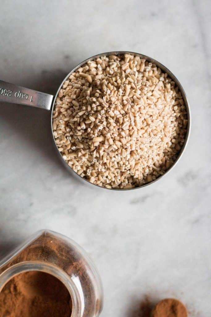 steel-cut oats in a measuring cup