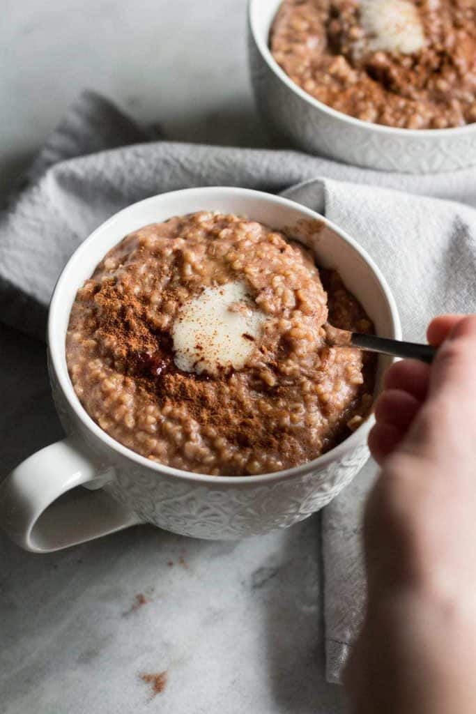 cinnamon roll steel-cut oatmeal in a mug