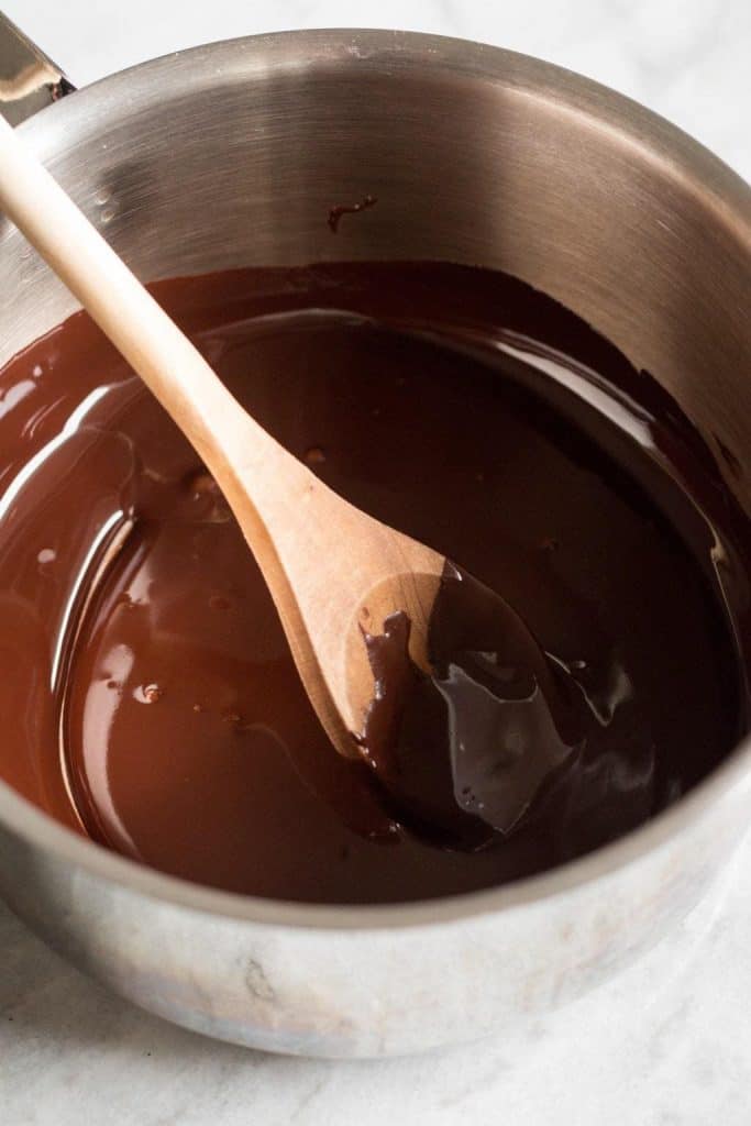 chocolate melted in a pot with spoon