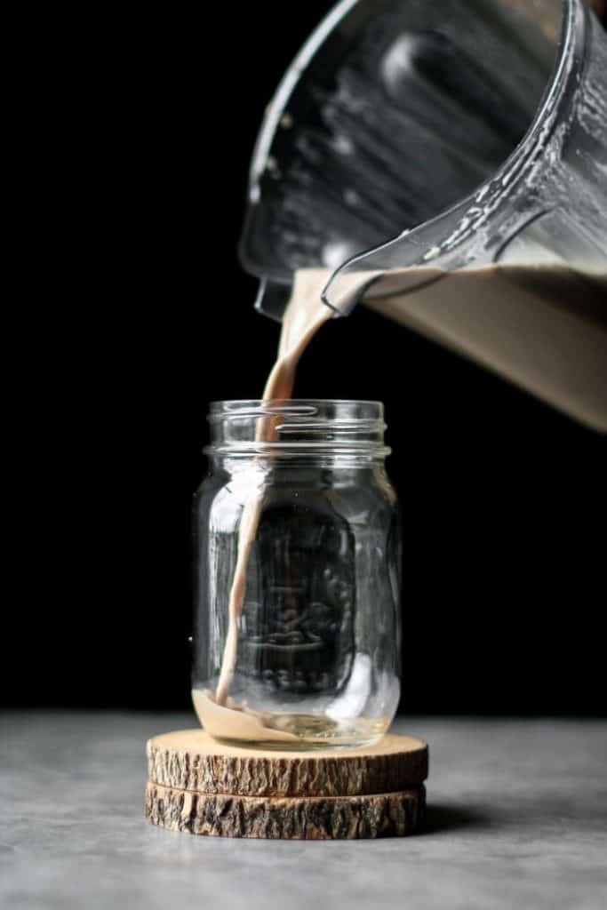 chai latte poured in a jar