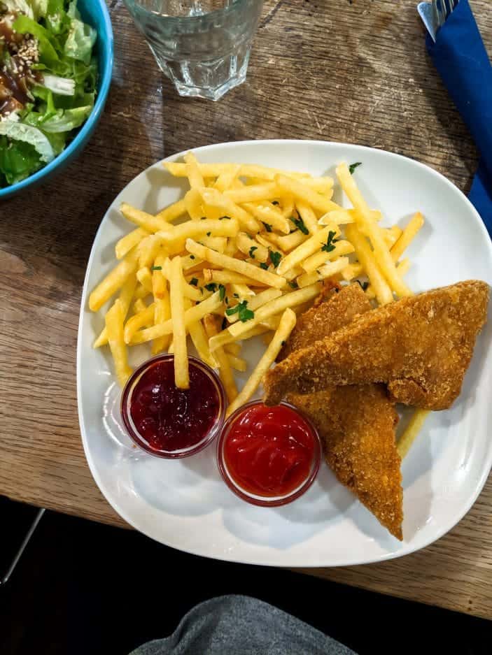 healthy while traveling - fries and vegan shnitzel 
