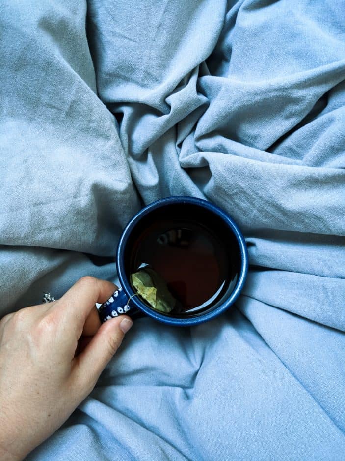How To Stay Healthy While Traveling - tea in blankets