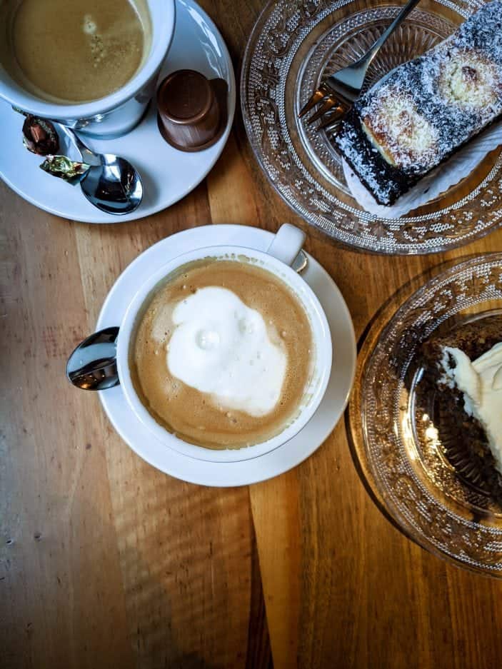 latte and cake in a Switzerland coffee shop