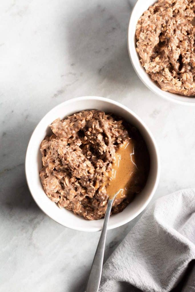 chocolate oats with hazelnut butter in a bowl