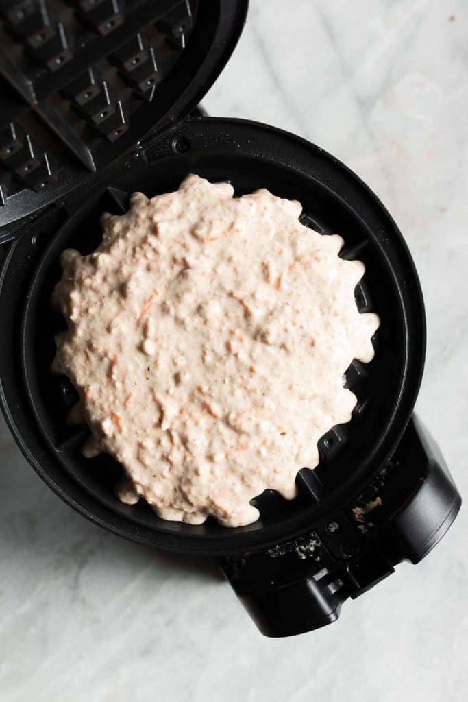 waffles mixture in a waffle maker