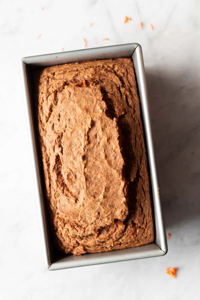 baked carrot cake loaf in a loaf pan