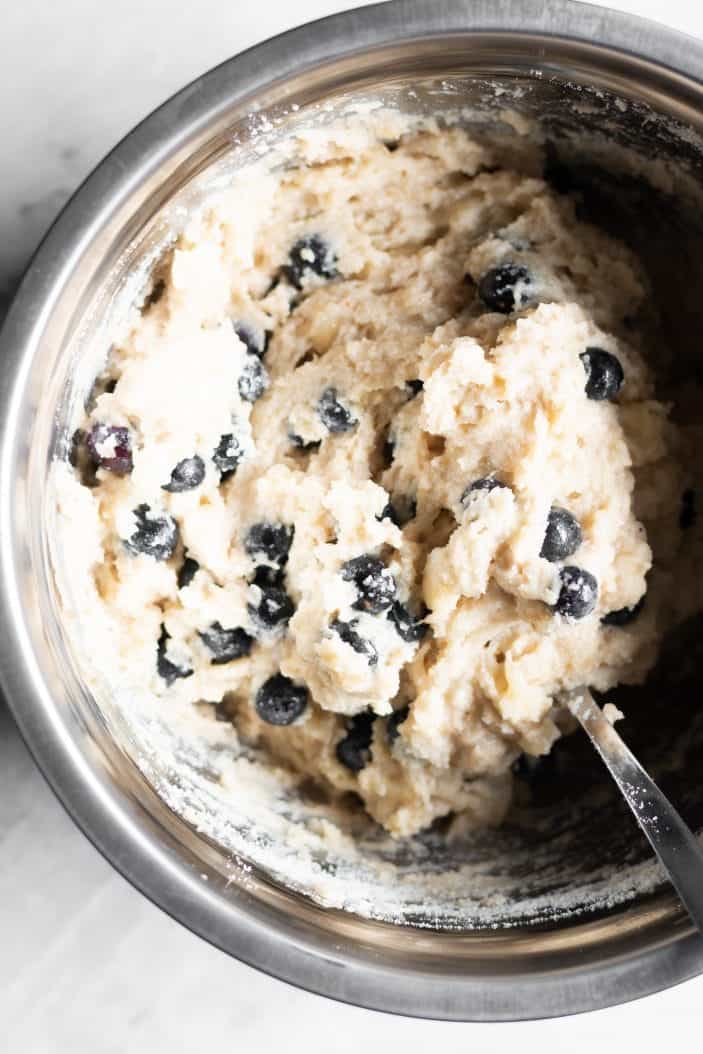 blueberry banana almond flour muffins mixture in a bowl