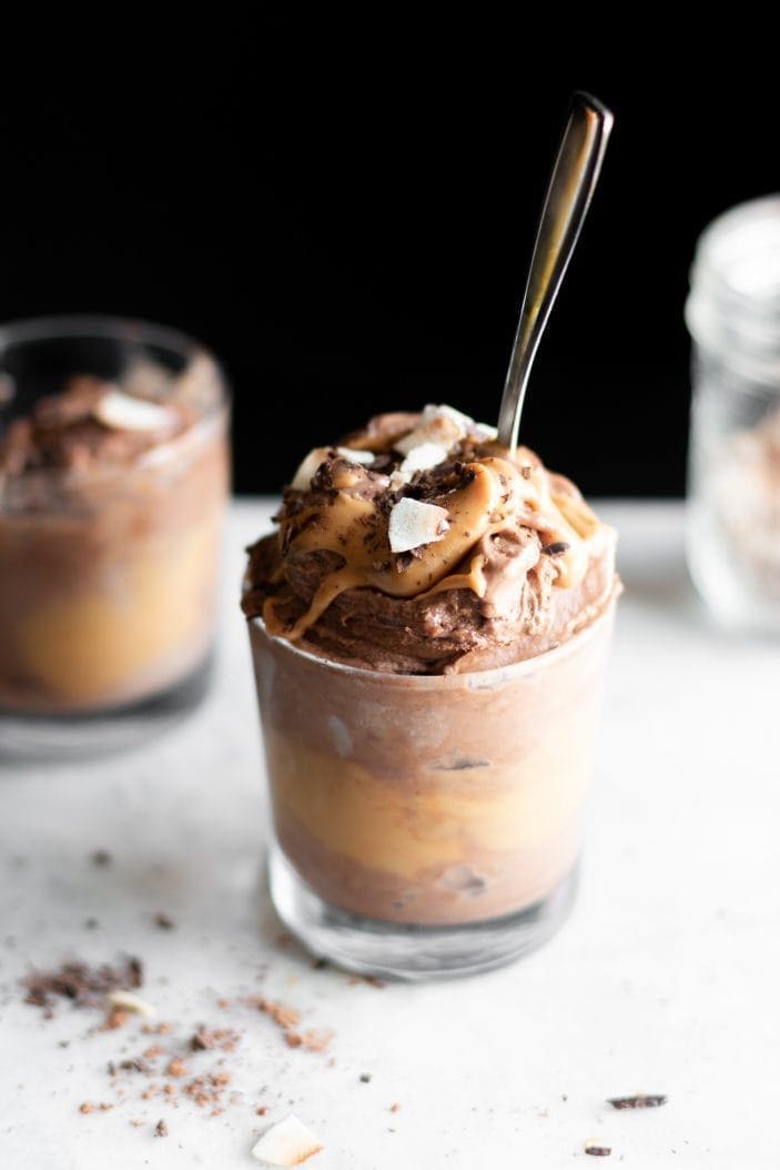 chocolate peanut butter banana ice cream in glass