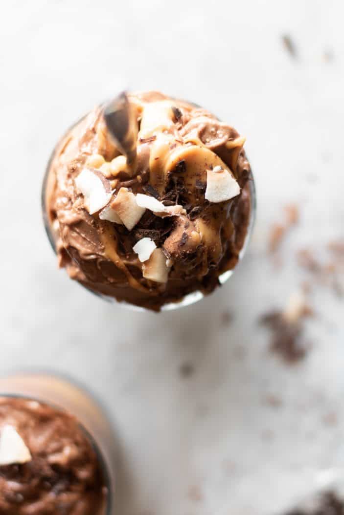 Chocolate Peanut Butter banana ice cream in a glass from top