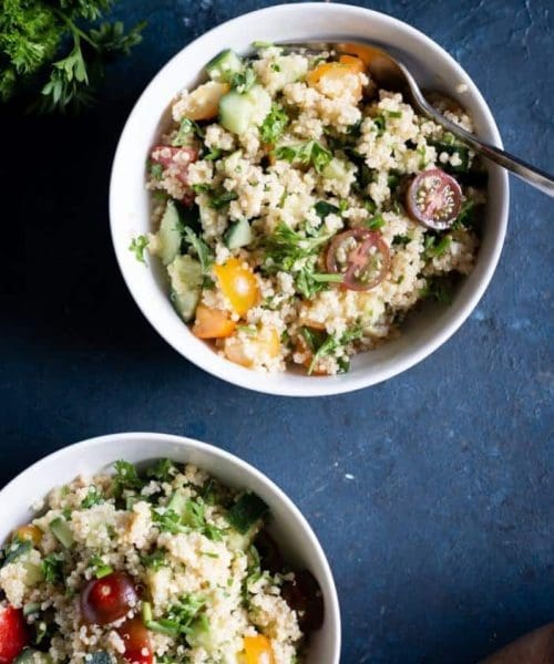 summer quinoa salad in two bowls from the top