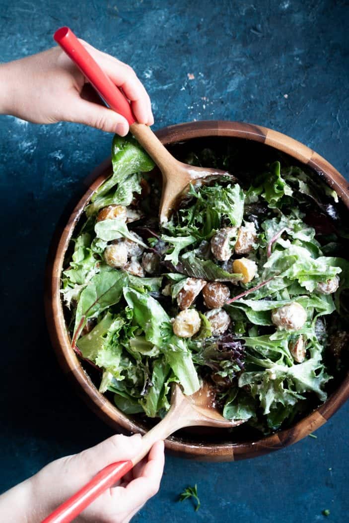 roasted potato herb salad in a bowl