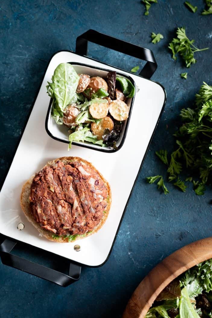 grillable walnut veggie burger from the top with salad