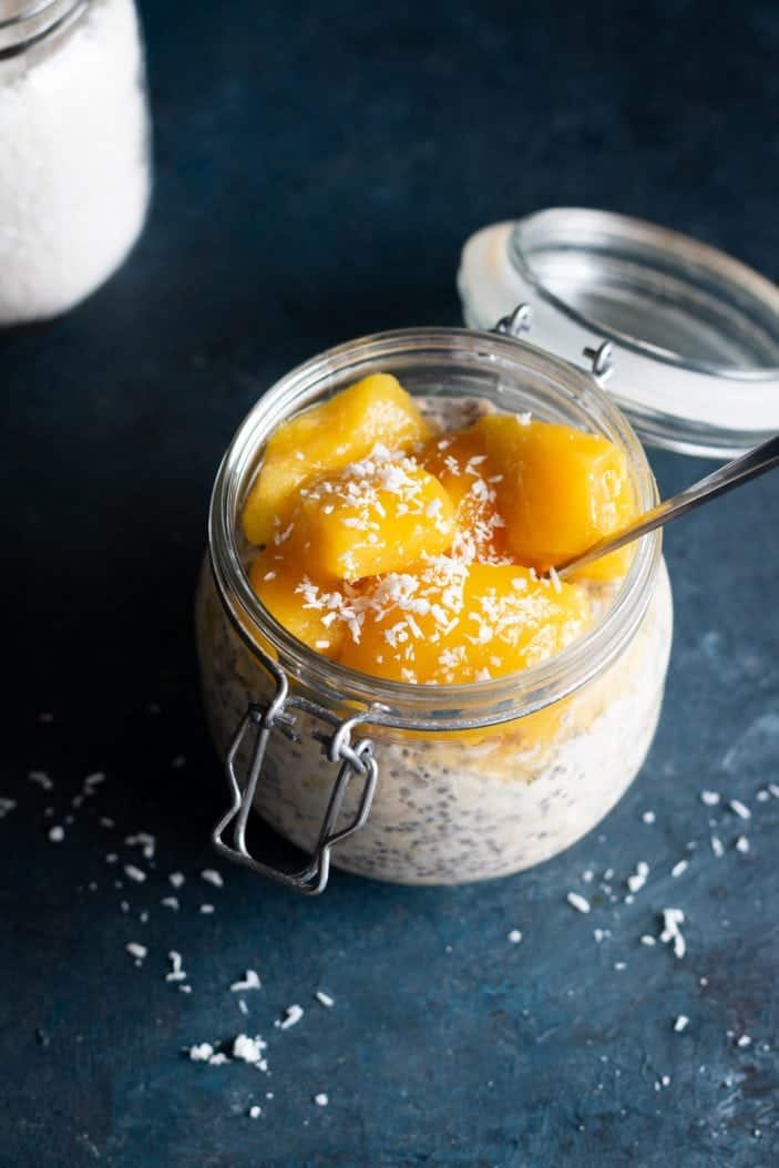 tropical coconut overnight oats with mango in a jar