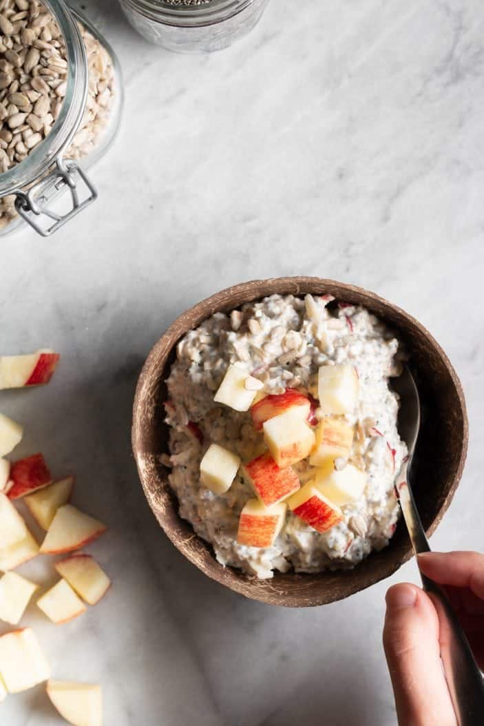 apple muesli in a bowl from top