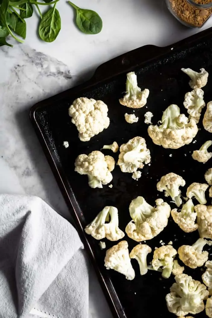 cauliflower on baking sheet