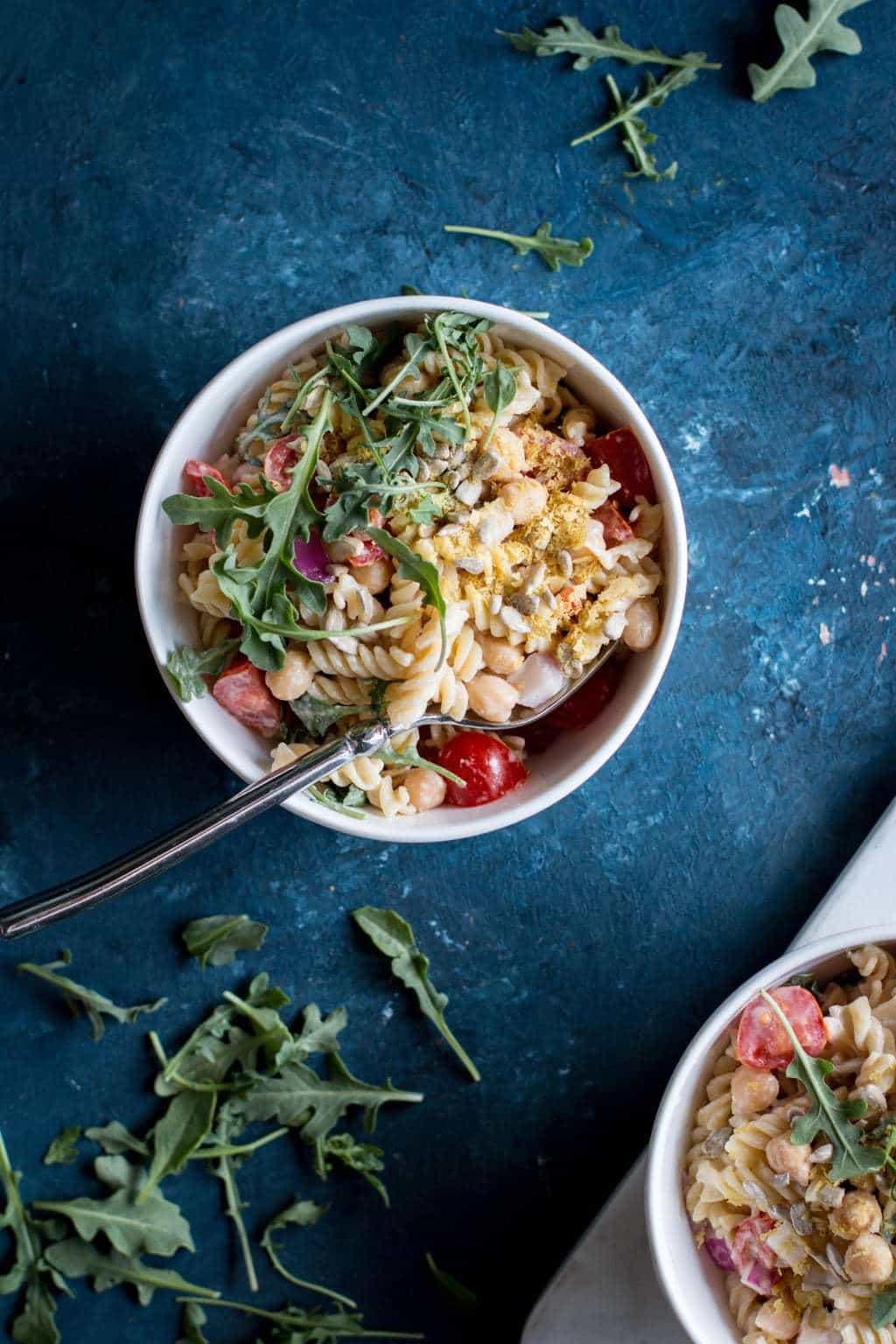 tahini pasta salad in a bowl from the top