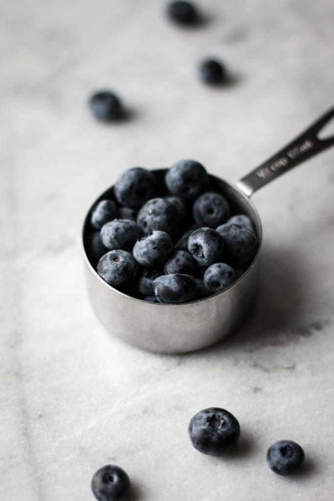 blueberries in a measuring cup