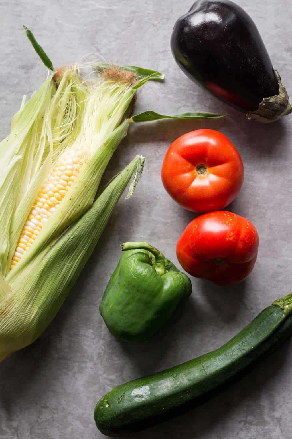 corn, pepper, zucchini, tomatoes and eggplant