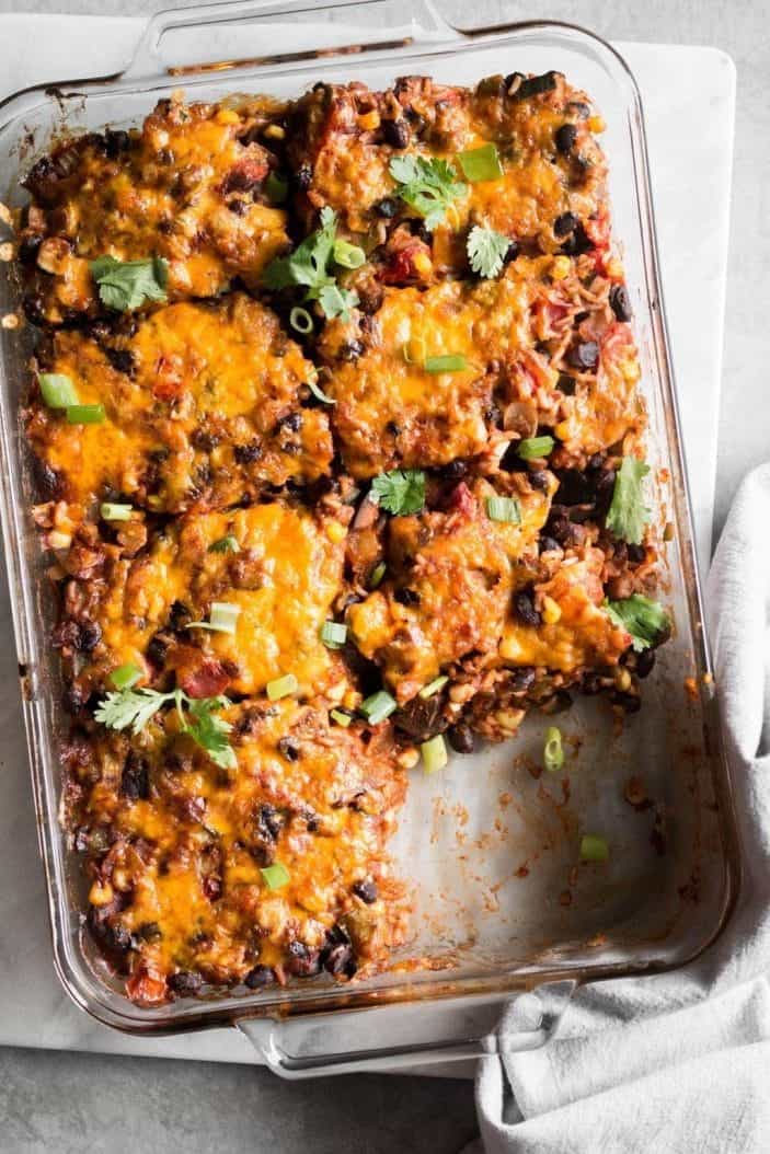 late summer vegetarian Tex-Mex casserole from the top with a portion taken