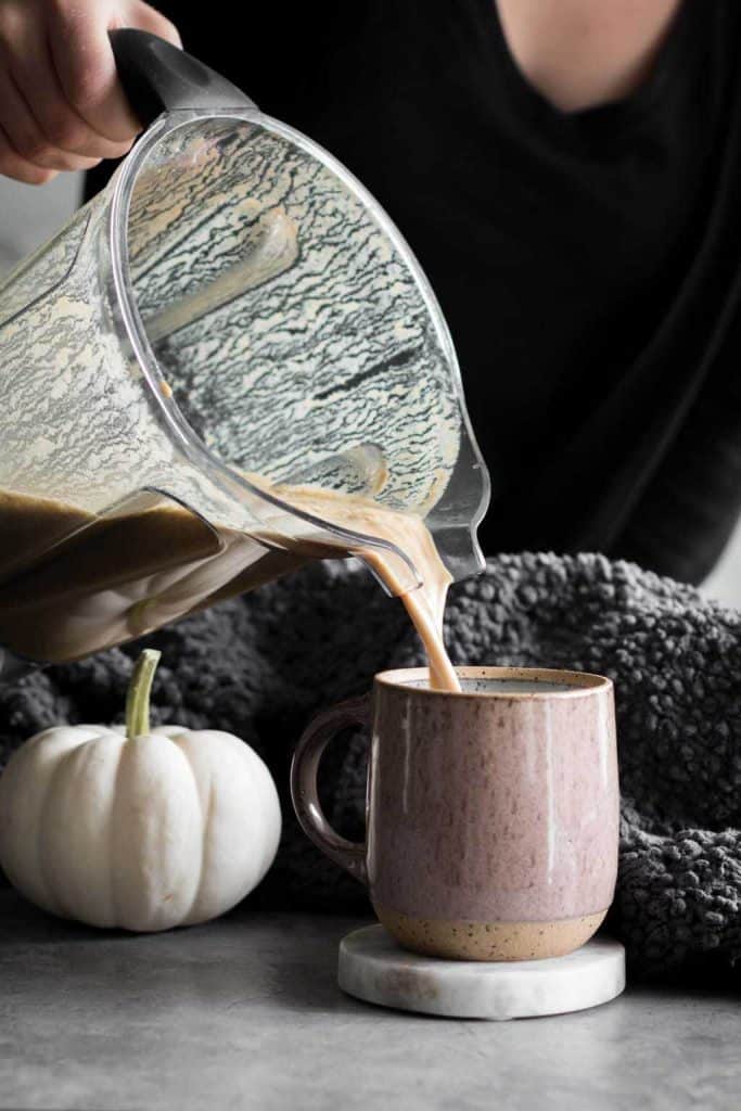 latte poured into a mug