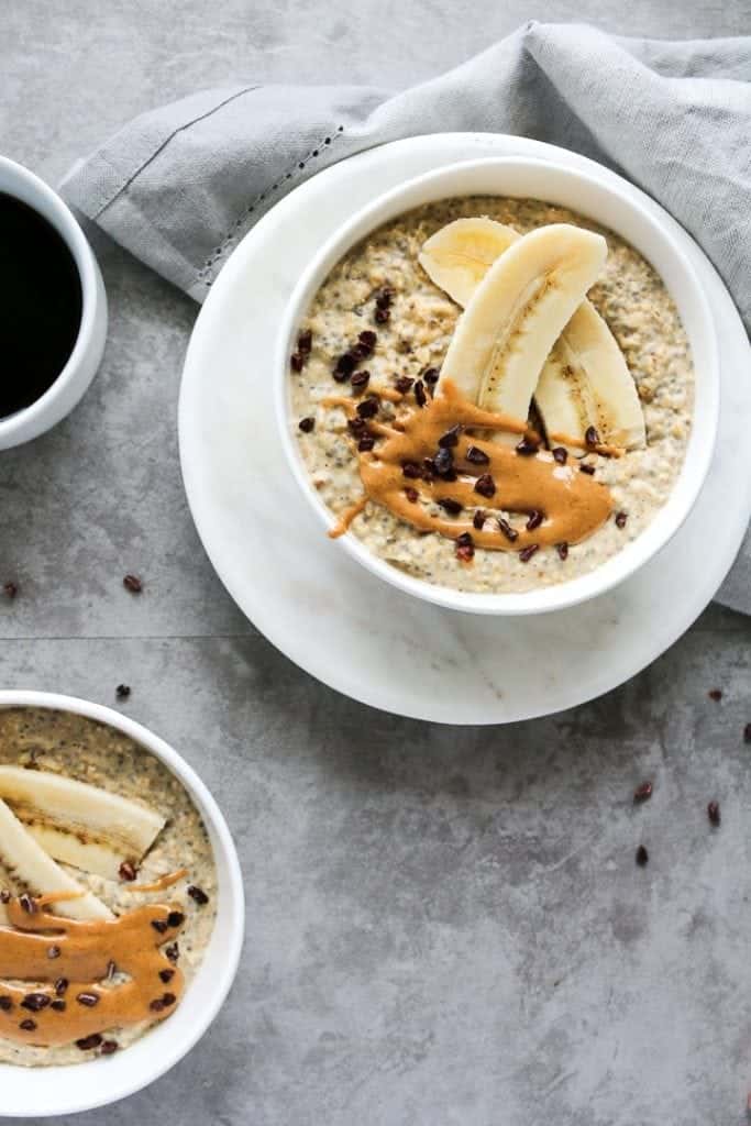 peanut butter banana oatmeal in bowls seen from the top