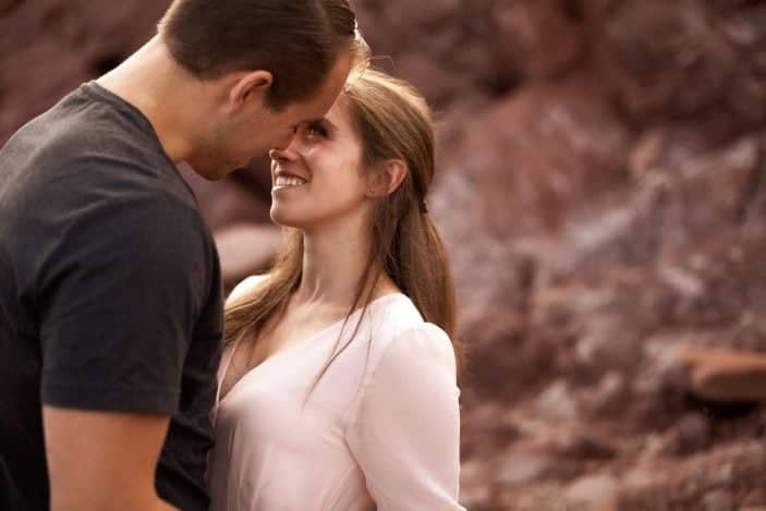 couple looking at each other laughing