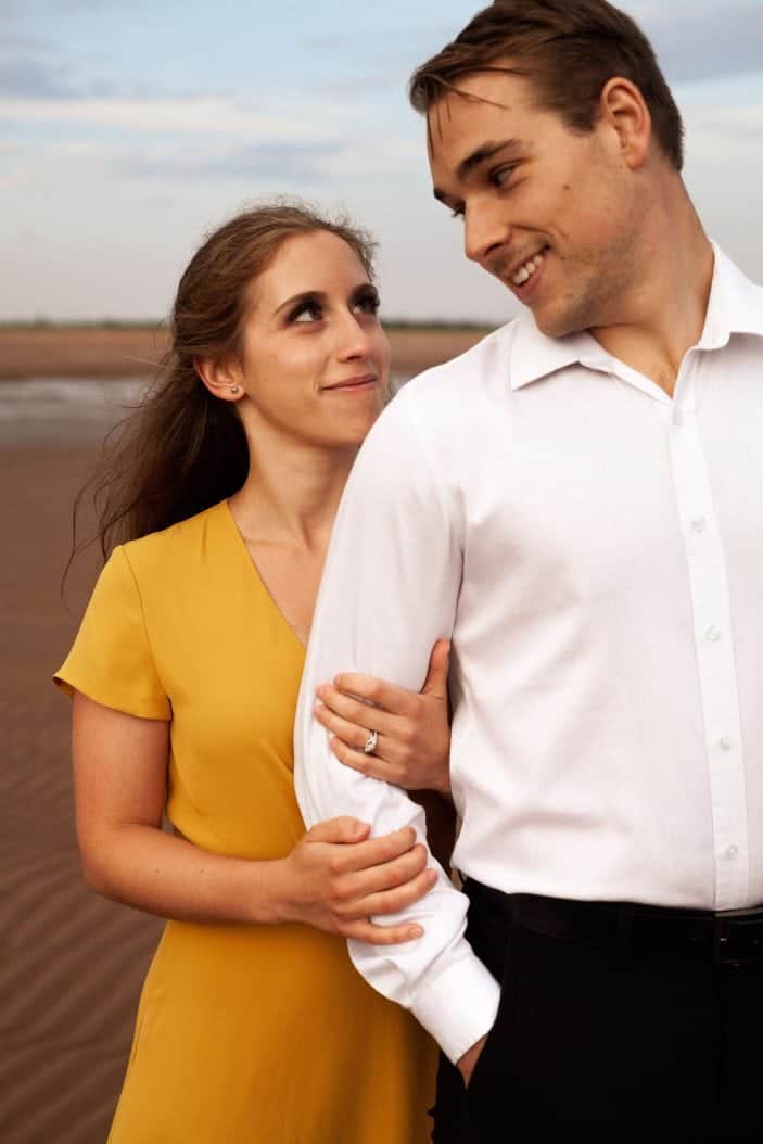 girl smiling at guy - engagement photos