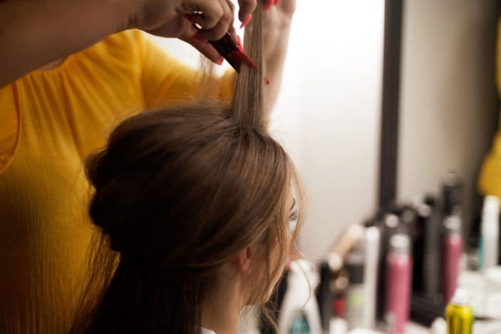 bride getting hair done