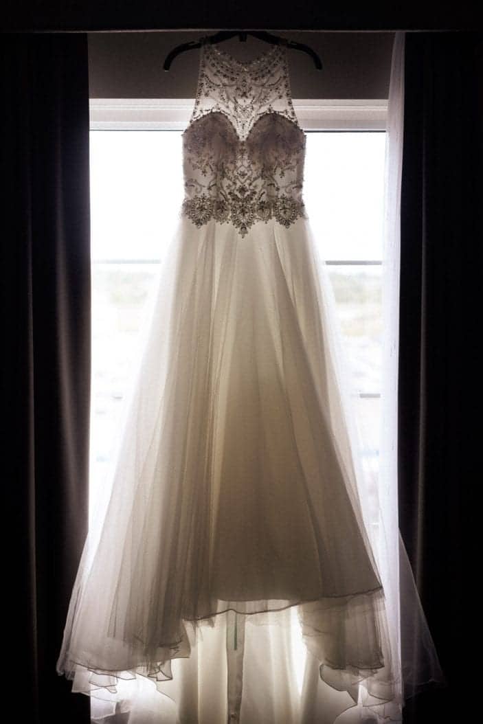 bride's dress in from of window