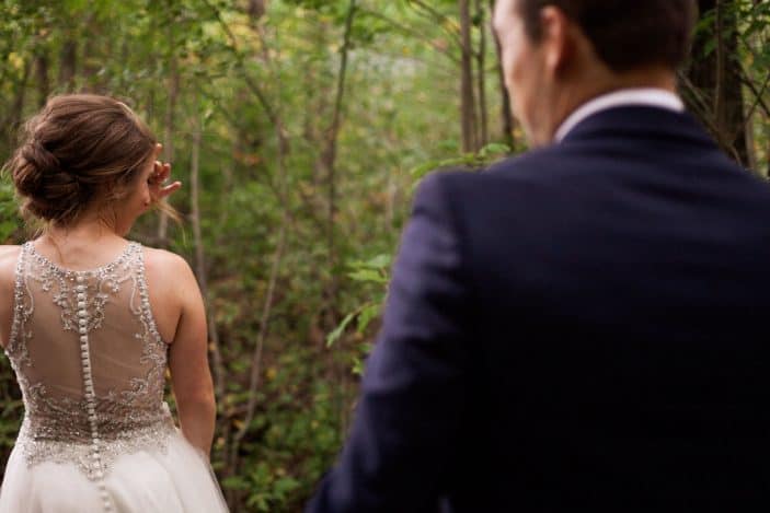 Our rustic chic and cozy fall wedding - groom looking at bride