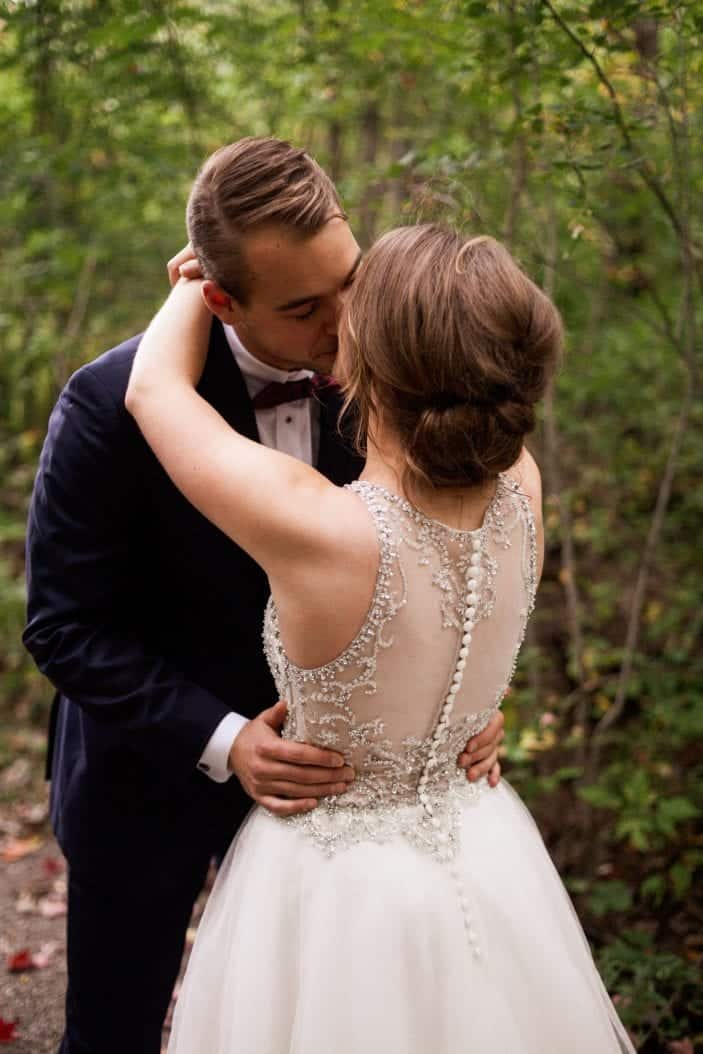 Our rustic chic and cozy fall wedding - bride and groom kissing