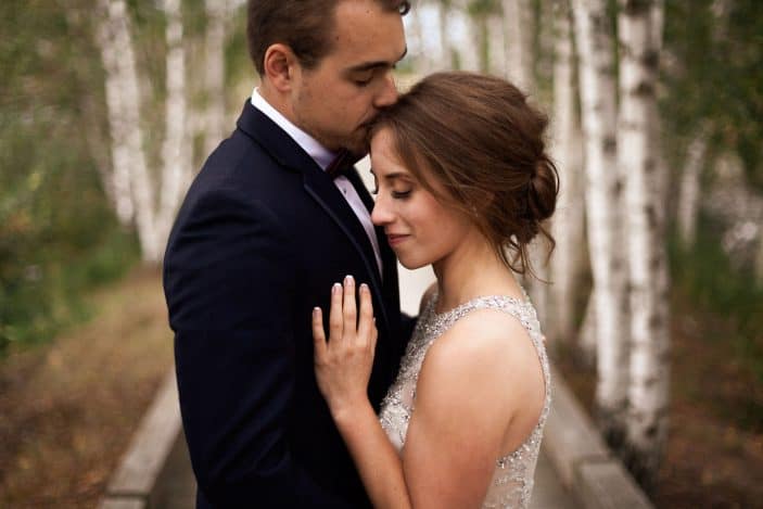 bride and groom hugging - cozy fall wedding